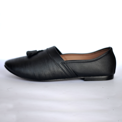 BLACK TUSSEL SLIP-ONS