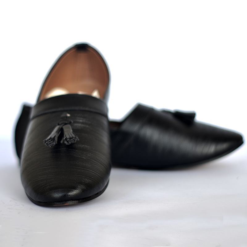 BLACK TUSSEL SLIP-ONS